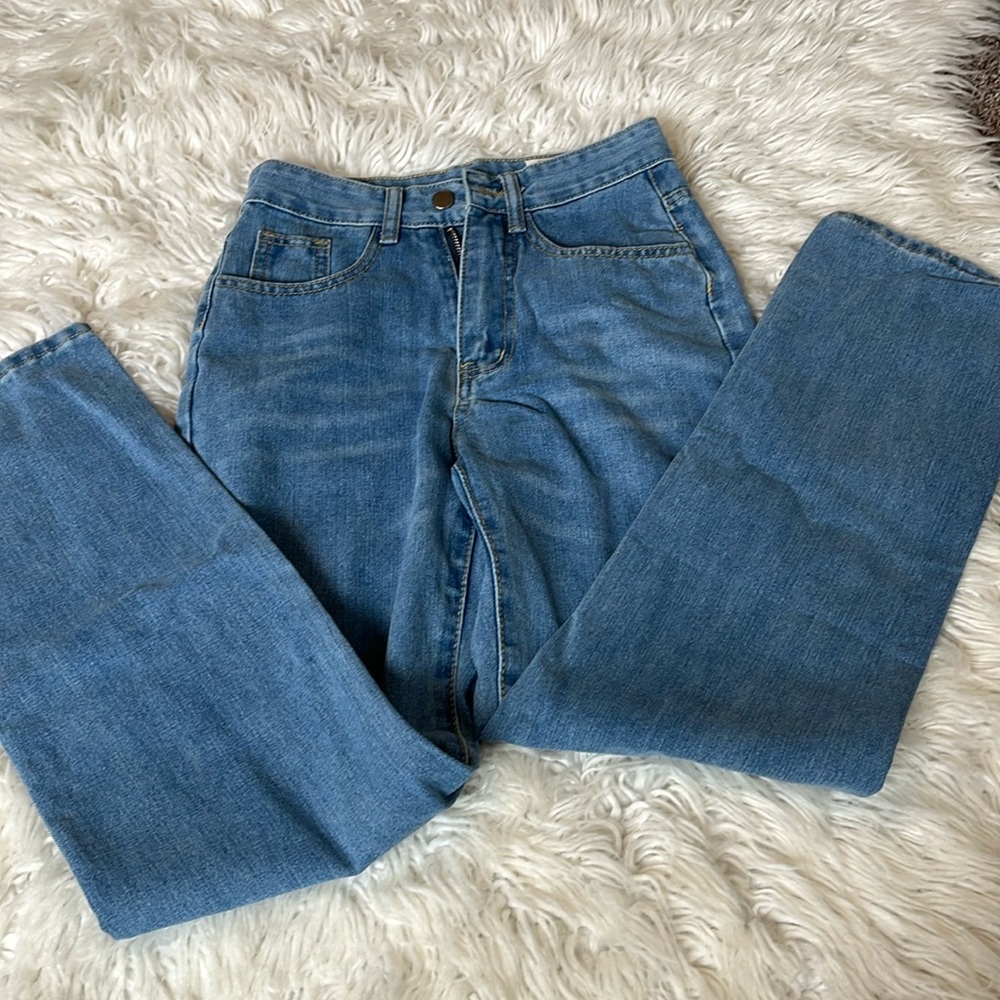 Light blue Jeans for woman size XXS.